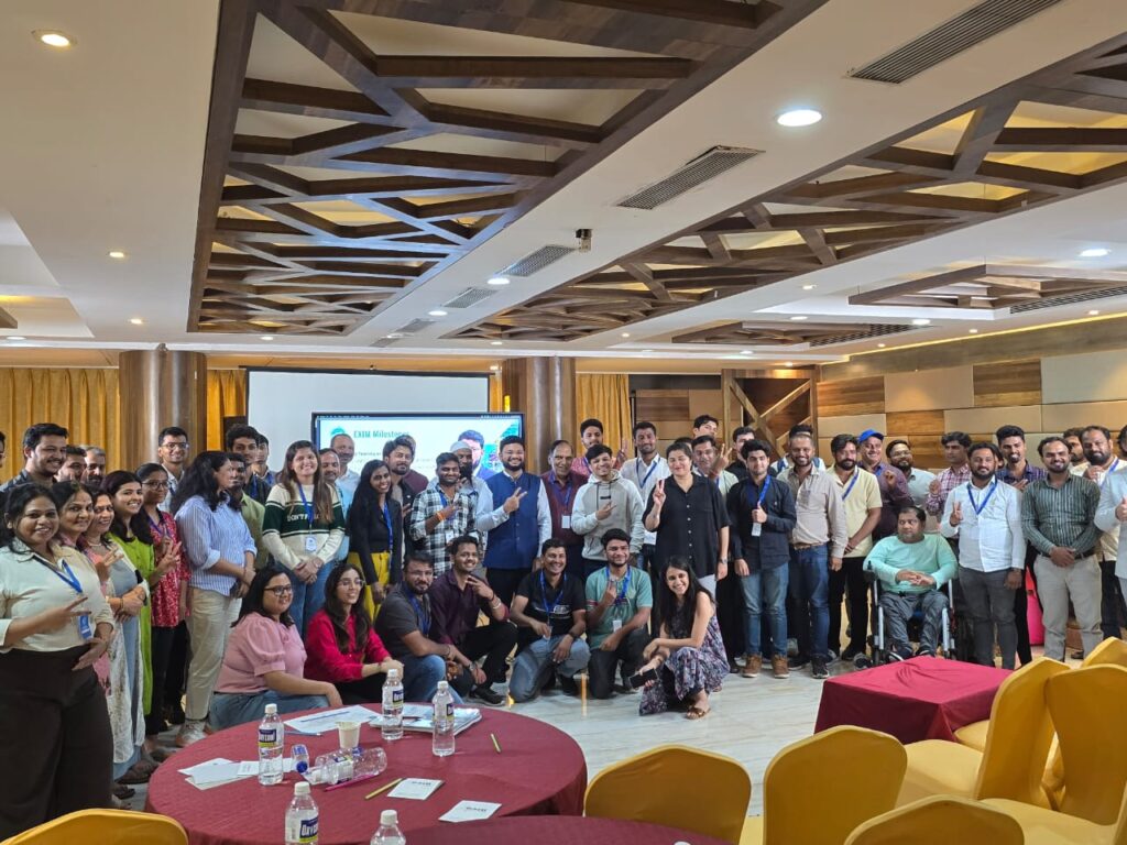 Students attending an import-export training class in India with logistics and global-trade icons